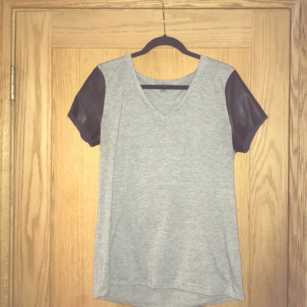 Grey t-shirt with black vegan leather sleeves
